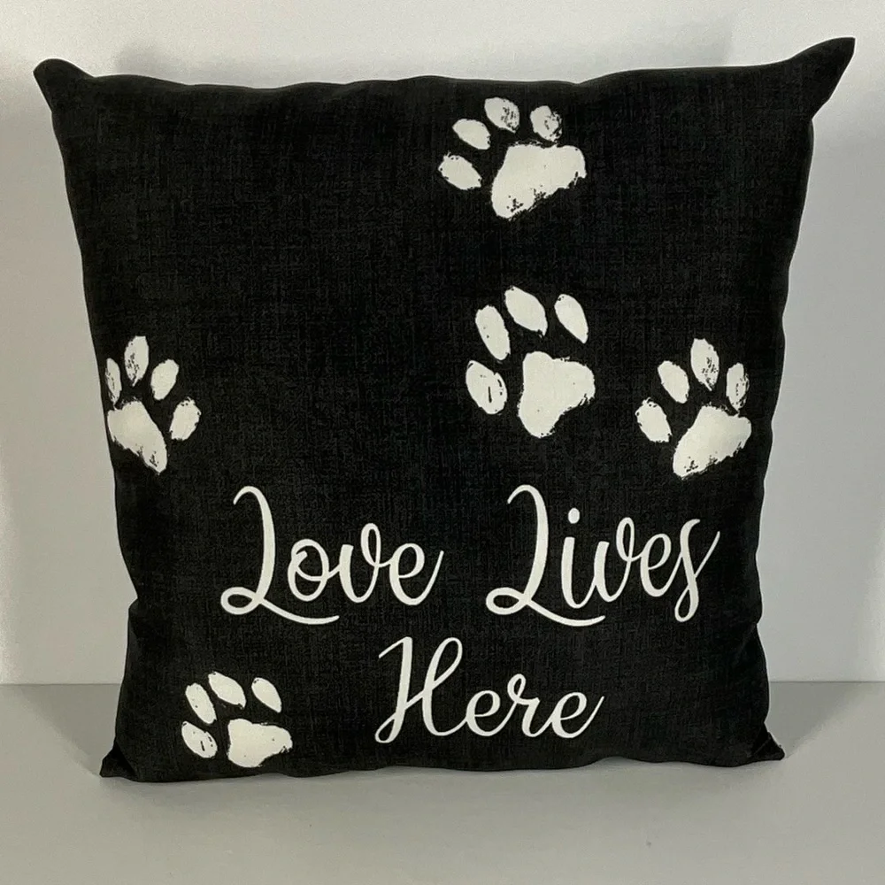 Mainstays Outdoor Black Pillow with White Paw Prints and Text‎ | 16 in. x 16 in.